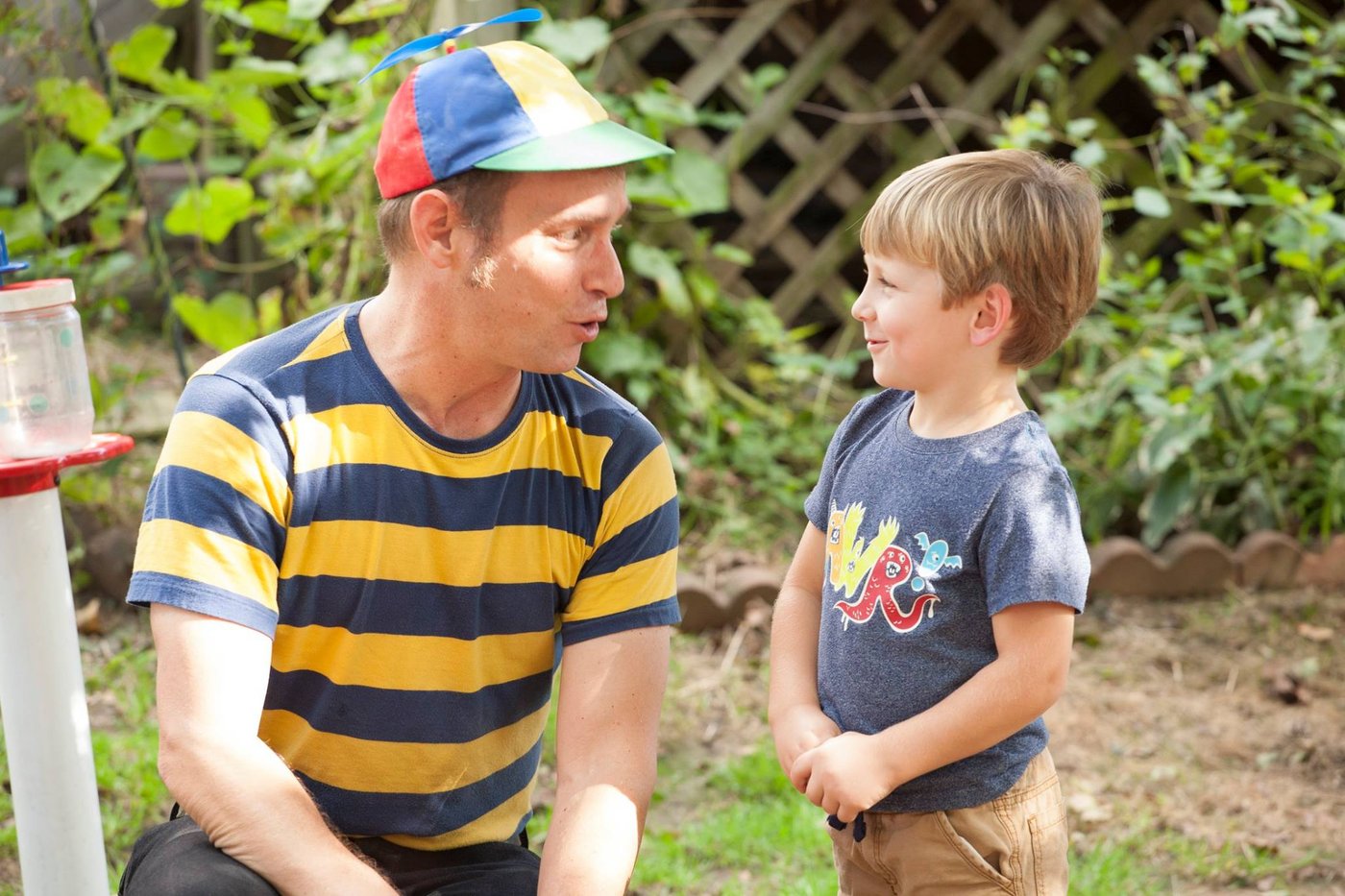 Mr. Twisty making a kid laugh at a birthday party
