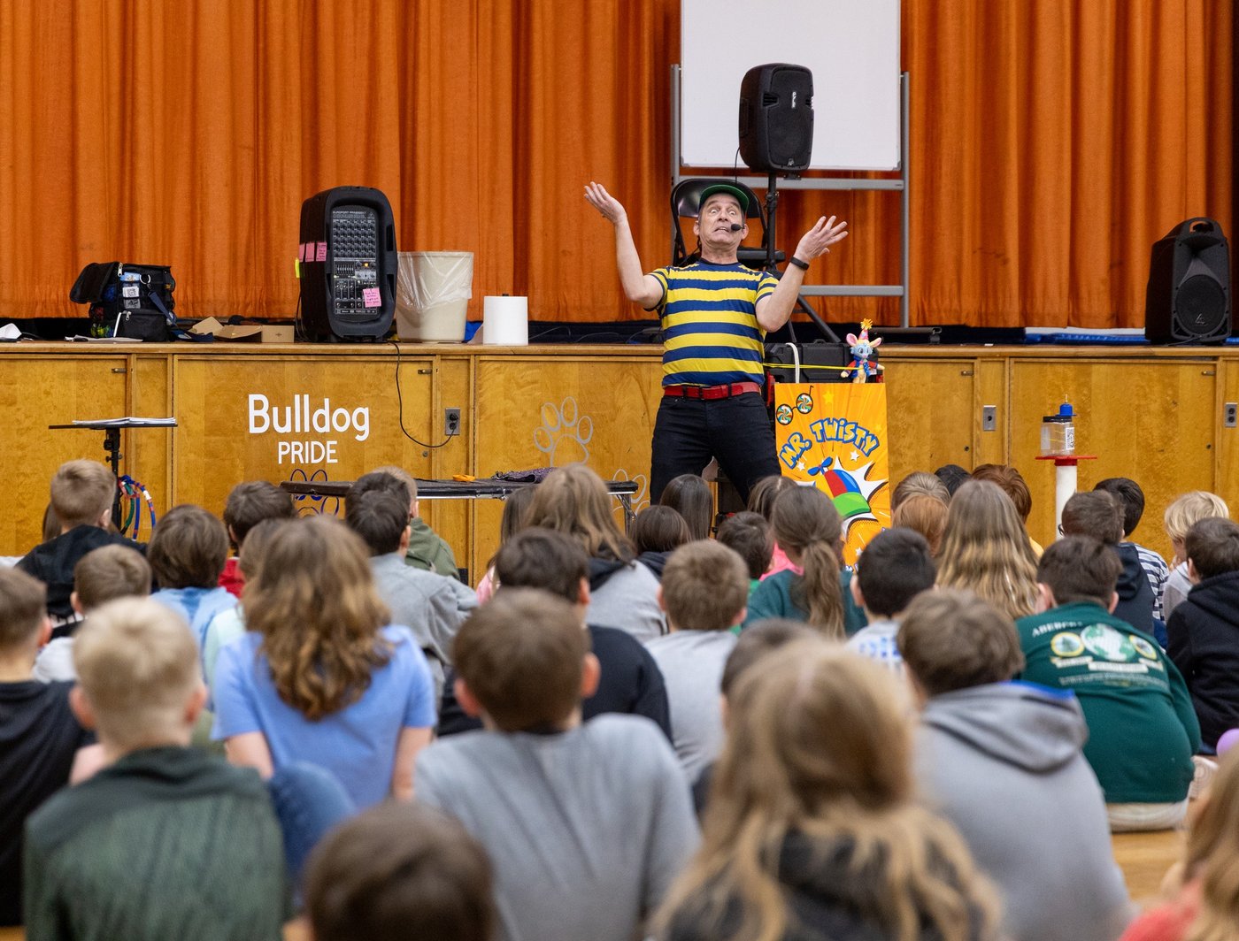 Mr. Twisty doing comedy in a library setting